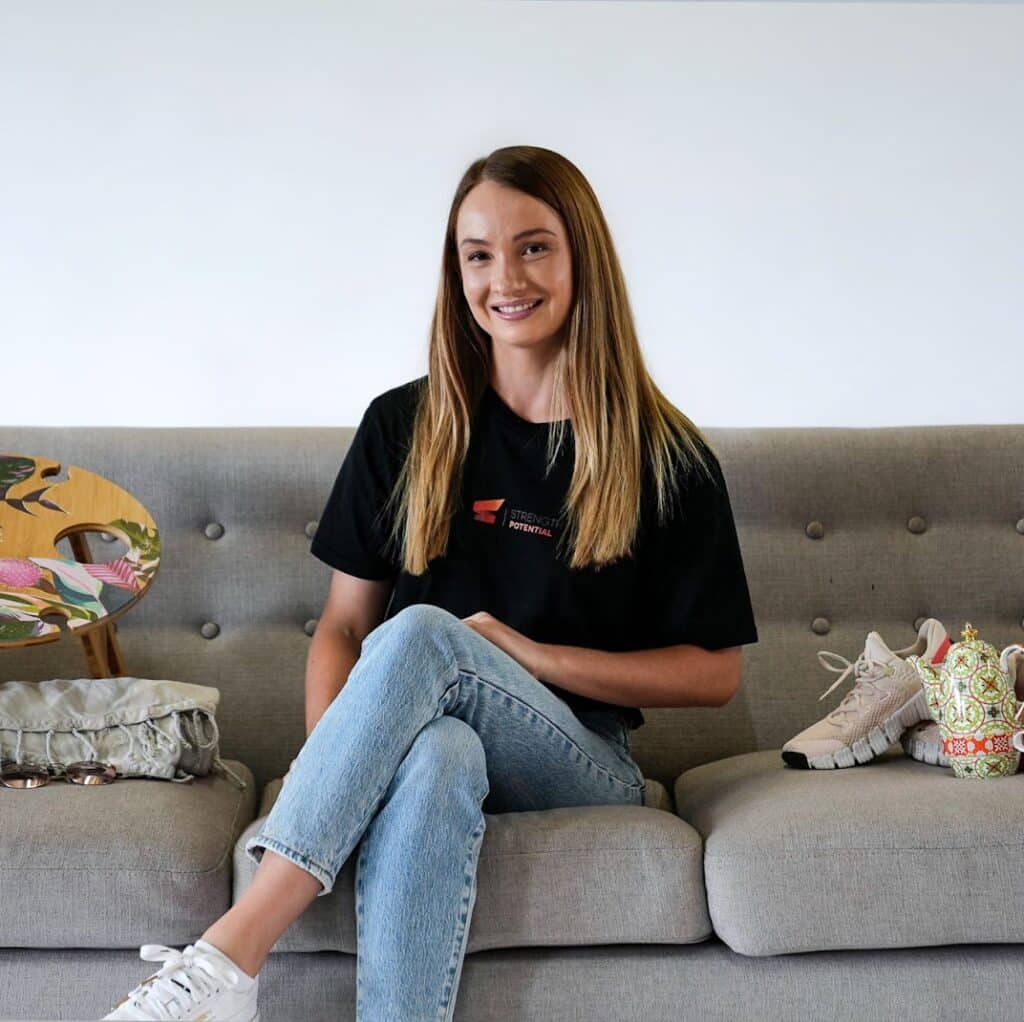strength-potential-team-member-Carmen-sitting-portrait